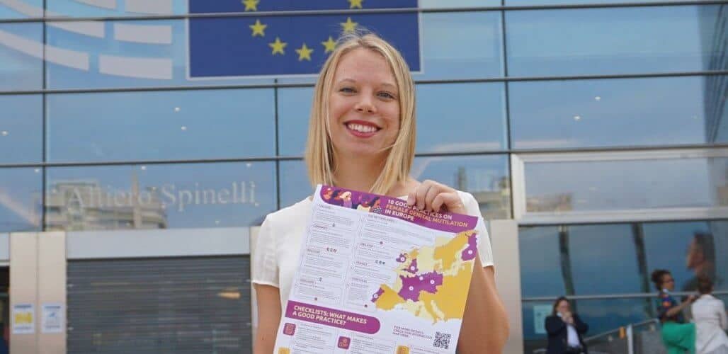 Anna Widegren with End FGM EU Good Practice Poster in Brussels